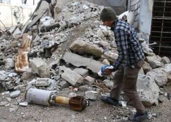 Syrian rights group: Bombing near Damascus kills over 100 in one day