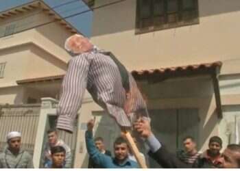 Palestinian protesters burn Abbas effigy in Gaza rally