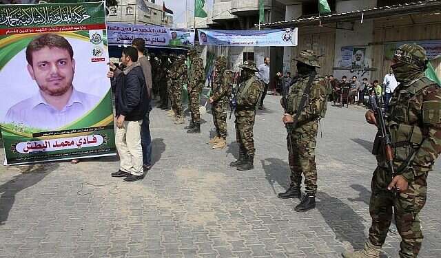 Hamas gunmen in front of Fadi al-Batsh's family home in Gaza Hamas vows to avenge assassination of drone scientist in Malaysia