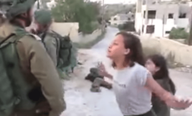 Janna Tamimi verbally assaulting IDF soldiers in Nabi Saleh Palestinian girl follows cousin Ahed Tamimi's lead, assaults IDF soldiers