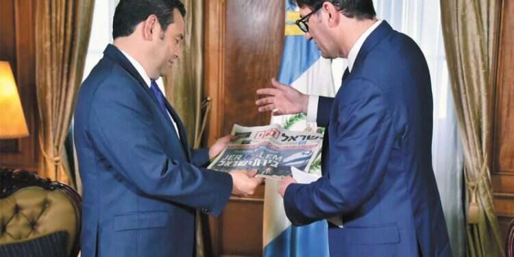 Guatemalan President Jimmy Morales and Israel Hayom Editor-in-Chief Boaz Bismuth Guatelaman president hails upcoming embassy move back to Jerusalem