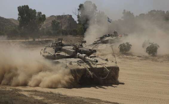 IDF shells Hamas post after Palestinians breach Gaza border
