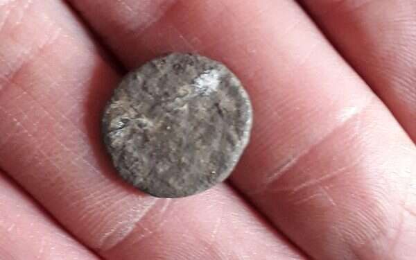 Students on archaeology program unearth 1,700-year-old coin