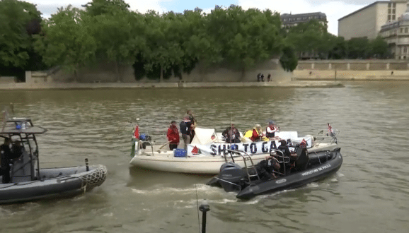 French police stop the Gaza-bound boats from docking in Paris French police block Gaza-bound boats from docking in Paris