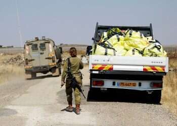 Israel threatens Syria over Golan deployment, extends refugee aid