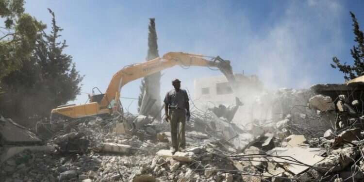 Jihad Shawamrah stands on the ruins of his demolished house in the east Jerusalem neighborhood of Beit Hanina Palestinians in Jerusalem demolish homes rather than let Jews move in