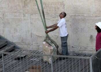 Authorities weigh replacing stone that fell out of Western Wall