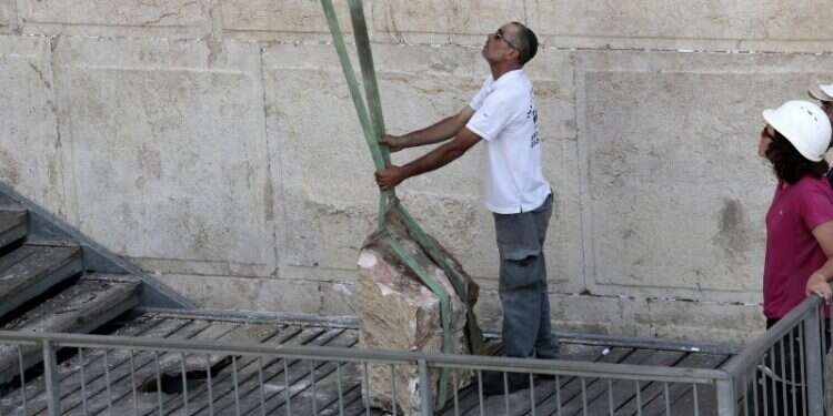 Authorities weigh replacing stone that fell out of Western Wall