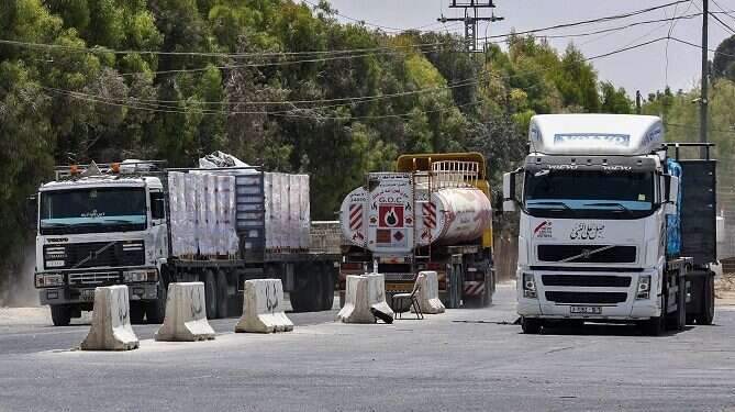 Fuel trucks at the Kerem Shalom border crossing between Israel and Gaza Israel halts fuel supply to Gaza over arson balloon terrorism