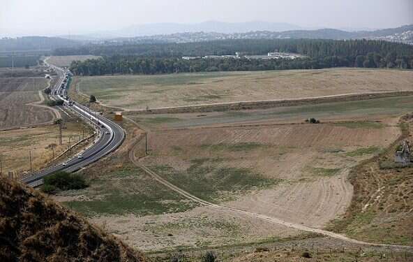 Workers dig at the Tel Megiddo archaeological site in northern Israel |||