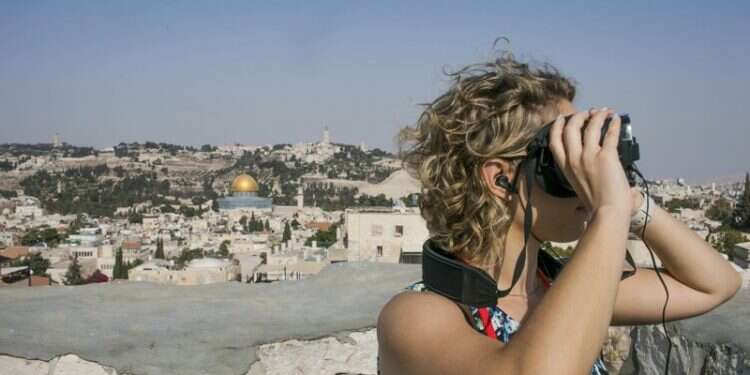 A visitor uses goggles on a new virtual reality tour of ancient Jerusalem Virtual reality tour brings biblical-era Jerusalem to life
