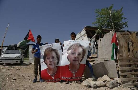 Bedouin families appeal to Merkel to help block village's demolition