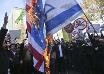 Iranian protesters chant 'Death to America' over fresh US sanctions