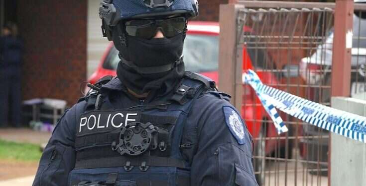 An Australian special forces officer at the scene of the attack Islamic State claims deadly Melbourne stabbing