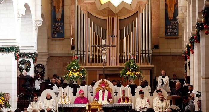 A clergyman at the Christmas celebrations at Manger Square in Bethlehem ||