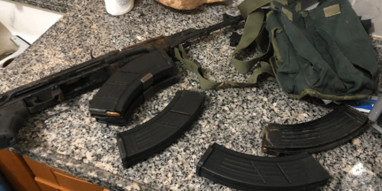 The scene of the lethal terrorist shooting at the Givat Asaf outpost in Samaria in December|The rifle and ammunition clips recovered by security forces when they arrested Barghouti |