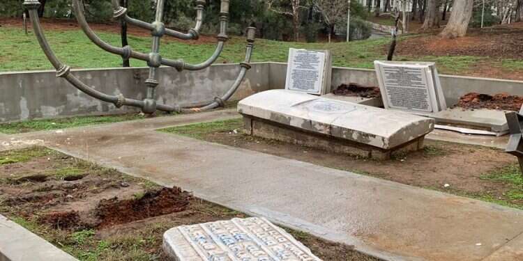 The vandalized monument marking the site of a Jewish cemetery destroyed by the Nazis in World War II Vandals smash Greek university's memorial to Jewish cemetery