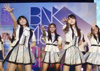 Singer in Thai girl band apologizes for swastika shirt