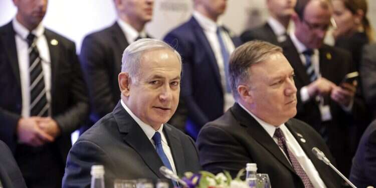 Prime Minister Benjamin Netanyahu sits beside U.S. Secretary of State Mike Pompeo at the Warsaw summit Leaked video offers glimpse of emerging Israel-Arab alliance
