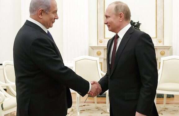 Prime Minister Benjamin Netanyahu shakes hands with Russian President Vladimir Putin during a meeting at the Kremlin in Moscow Netanyahu vows to bar Iran from securing presence in Syria