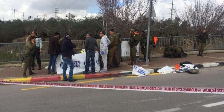 Security forces at the scene of Sunday's attack 'We heard shooting and hid behind concrete barriers'