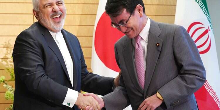Visiting Japan, Iranian FM blasts US sanctions