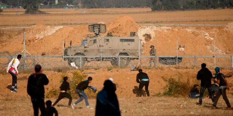 Israel vows to expand airstrikes, targets manned buildings