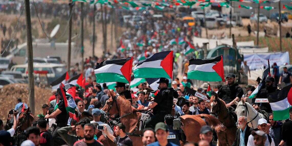 Palestinians demonstrate near the Gaza border on Rocks, explosive devices hurled at troops as Palestinians mark 'Nakba Day'