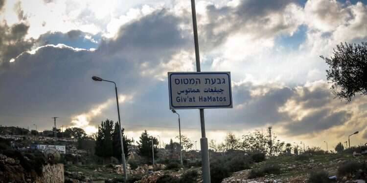 A sign marks the Givat Hamatos neighborhood in east Jerusalem, where construction is almost entirely frozen Still frozen