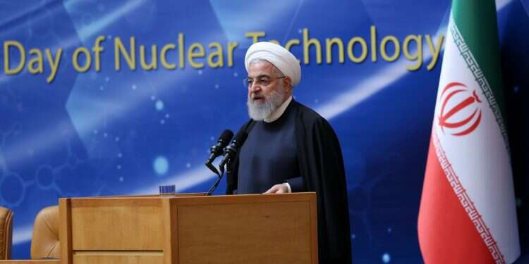 Iranian President Hassan Rouhani speaks during Iran's National Nuclear Day in Tehran, April 9 Iran set to restart some nuclear activity in response to US withdrawal from deal