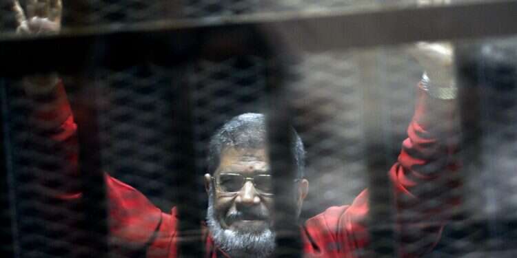 Mohammed Morsi, Egypt's ousted Islamist president, dies in court