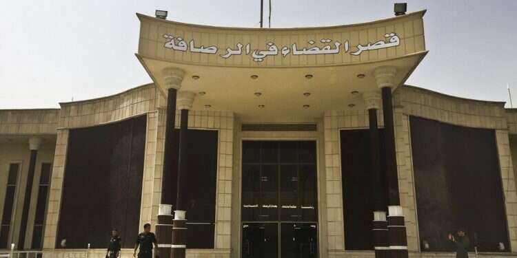 Security guards stand outside the building where Islamic State militants are tried in a special counterterrorism court in Baghdad, Iraq, last week 2 French ISIS members sentenced to death by Iraqi court