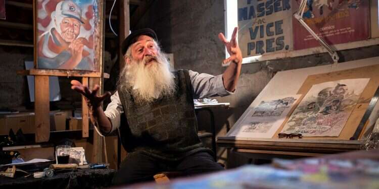 From Batman to Holy Land, comics artist sees heroes on all sides