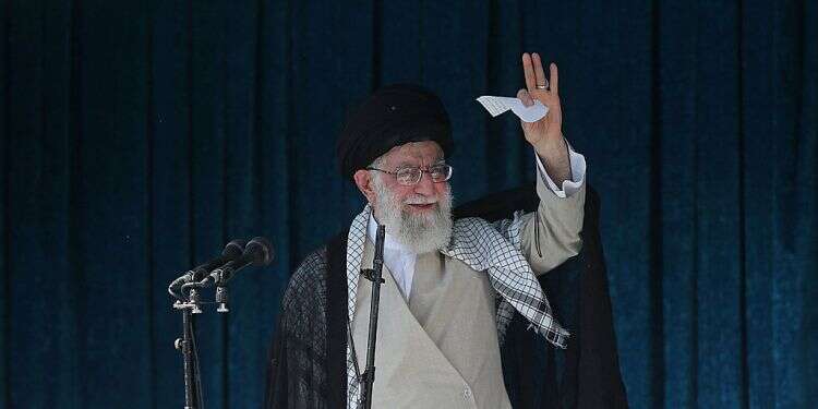 Iranian Supreme Leader Ayatollah Ali Khamenei waves to the crowd after the Eid al-Fitr prayer In shift, Iran says it is willing to discuss missile program