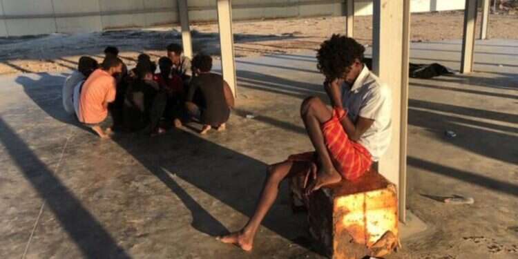 Migrants rescued by Libya's coast guard after their wooden boat capsized off the country's coast, Thursday 115 feared dead after worst Mediterranean shipwreck of the year