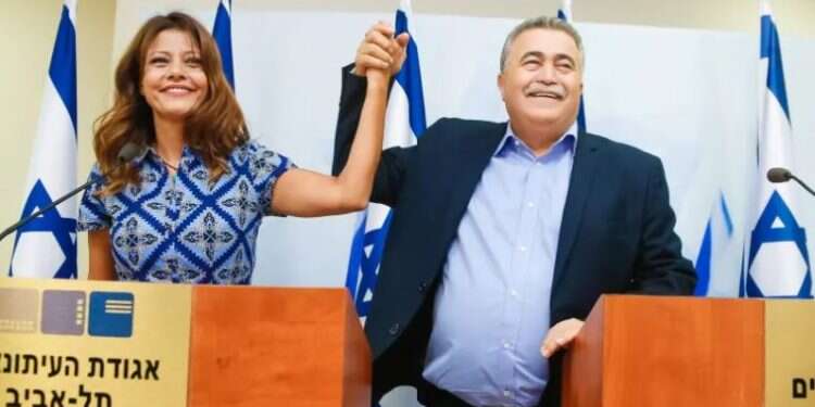 Gesher leader Orly Levy-Abekasis and Labor chief Amir Peretz, Thursday Much to Meretz's chagrin, Labor opts to merge with Gesher