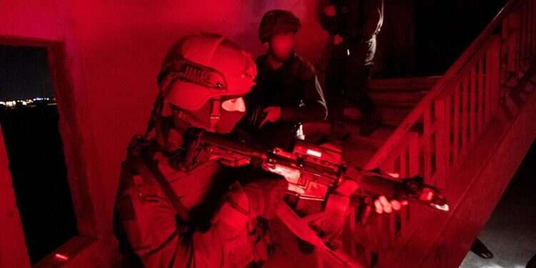 IDF troops drill inside a stairwell at the IDF's Counterterror School near Modiin Watch: IDF troops drill counterterror tactics