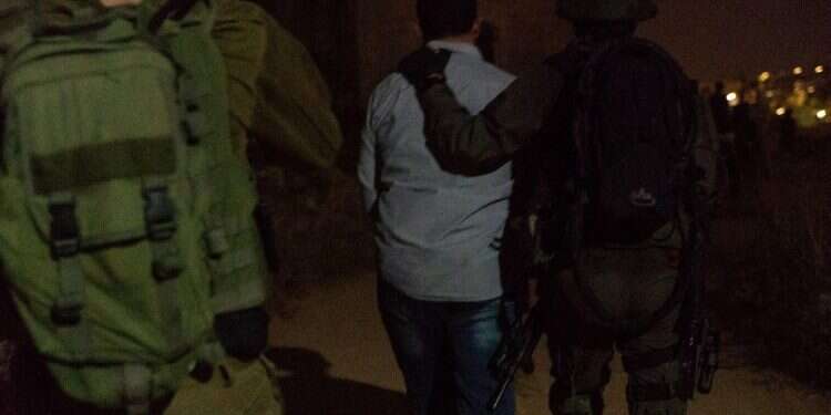 IDF soldiers arrest a Hamas operative suspected in a terror funding scheme, Tuesday night Israel foils Hamas terror funding scheme linking Gaza, West Bank