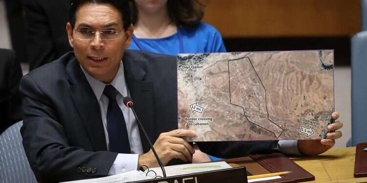 Israeli Ambassador to the UN Danny Danon shows the Security Council a map of the area in Syria where Iran is recruiting and training upwards of 80,000 Shiite fighters at a base five miles from Damascus, April 26, 2018 Israel to UN: Recognize Syrian responsibility for Iranian activity on its soil
