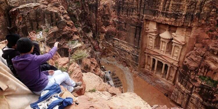 Tourists point at the Treasury, in the Jordan's Petra archaeological park Jordan halts film that refers to historical Jewish presence