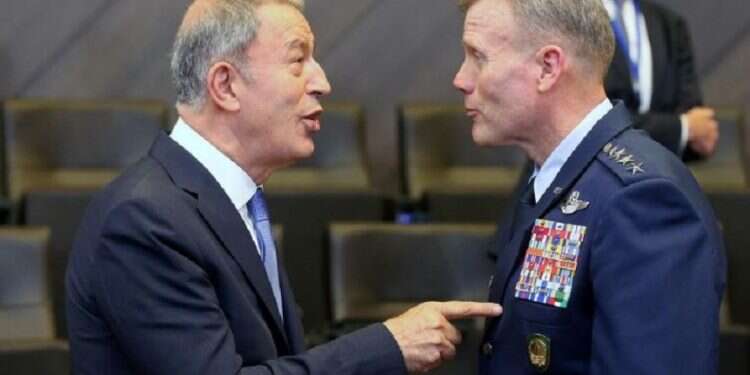 Turkish Defense Minister Hulusi Akar and the Supreme Allied Commander Europe, US Air Force General Tod Wolters, speak at a NATO meeting in Brussels on June 26 Turkey, US agree to form joint operation center for Syria safe zone