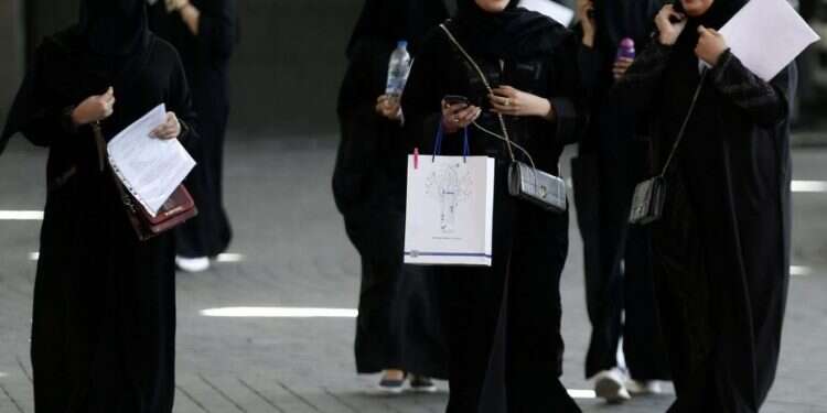 Saudi Arabia lifts travel restrictions on women, grants them greater control