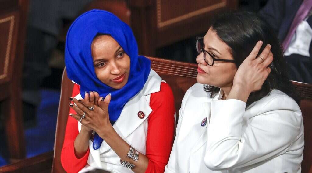 Rep. Ilhan Omar, (D-Minn.), left, joined at right by Rep. Rashida Tlaib, (D-Mich.), listen to US President Donald Trump's State of the Union speech at the Capitol in Washington Republicans: 'Attention-grabbers' will not hijack bipartisan goodwill from Israel trip