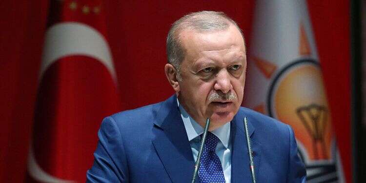 Turkey's President Recep Tayyip Erdoğan speaks to his ruling party officials, in Ankara, Turkey, Thursday, Sept. 5, 2019 Turkey plans to return 1 million Syrians, warns of new migrant wave in Europe