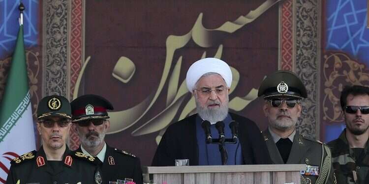 IIranian President Hassan Rouhani speaks at a military parade marking 39th anniversary of outset of Iran-Iraq war, near Tehran, Sunday Iran asks West to leave Persian Gulf amid heightened tensions