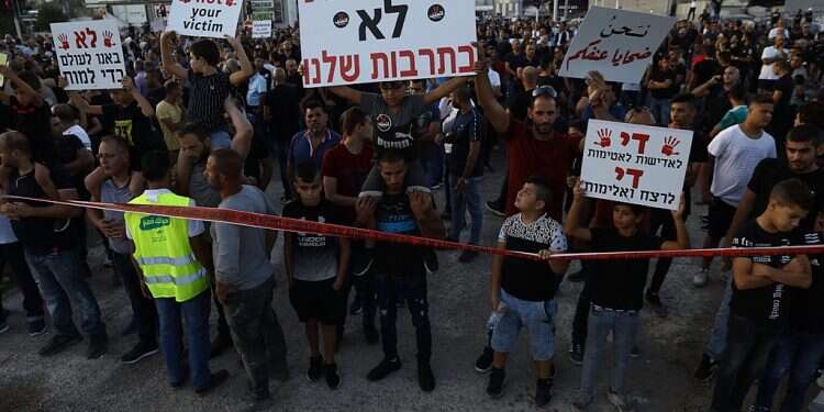 Residents of the Israeli Arab community Majd al-Krum in norhtern Israel protest violent crime. Signs read 'Violence - Not in Our Streets' and 'We Didn't Come into the World to Die' Netanyahu demands policy to combat crime in Arab communities