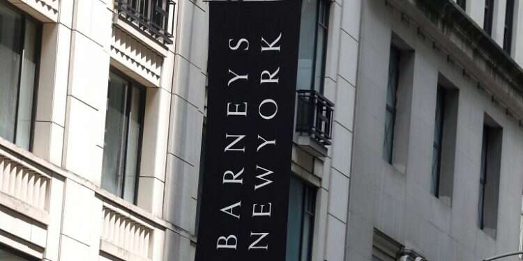 The Barneys New York sign is seen outside the luxury department store in New York Israeli fashion mogul submits bid for Barneys, challenging Authentic Brands
