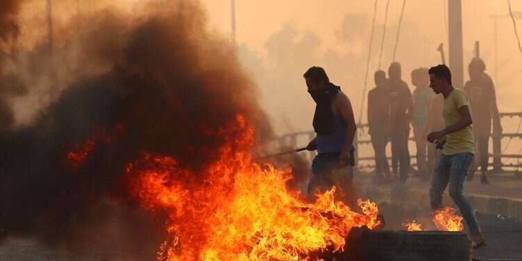 Death toll in Iraqi protests reaches 100 as 18 more killed