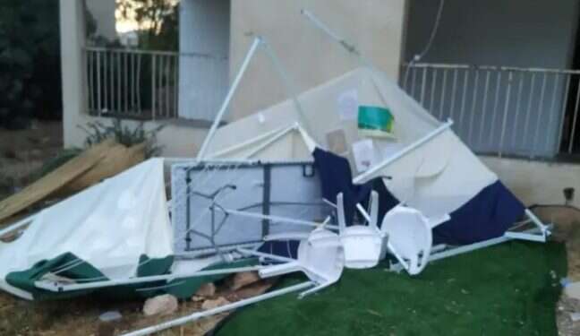 The sukkah of Shimon and Hadas Metzger of Nof Hagalil after Tuesday's storms High winds wreak havoc on Sukkot throughout Israel