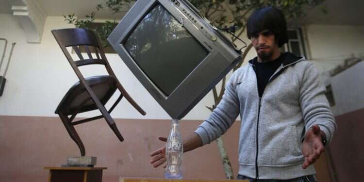 Gaza man defies gravity by mastering rare skill of balancing art